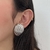 Aretes plateados con textura - comprar en línea
