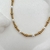 Collar de bolitas y perlas