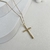 Cadena con dije de cruz