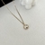 Cadena con dije de zirconia