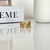 Anillo ajustable doble de estrellitas