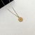 Cadena con dije de huellas
