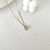 Cadena con dije de saturno