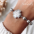 Pulsera Cruz del equilibrio AQ