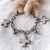 Pulsera tres cruces y bolitas AQ