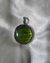 Dije piedra verde AQ