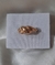Anillo con tres curvas en AD