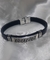 Pulsera simil cuero con detalles y cierre en AQ