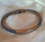 Pulsera simil cuero celeste con detalles y cierre en AQ