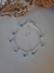 Pulsera eslabonada con dijes ojitos protectores, regulable en Plata 925