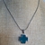 Conjunto cadena y dije cruz del equilibrio , en AQ