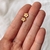 Aros pasantes mini flor con strass en AD