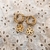 Argollitas con colgante flor en AD