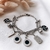 Pulsera con dijes en AQ