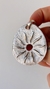 Dije sol en relieve en Plata 925