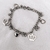 Pulsera con Bolitas y Coronas A.Q.