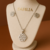 Conjunto Flores em aço inoxidavél hipoalegenico - comprar online