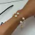 PULSEIRA 5 PÉROLAS ESSENCIAL - comprar online