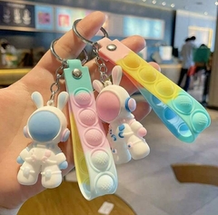 Chaveiro Astronauta Espaço Com Tira Pop It Anti Stress na internet