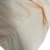 Detalhe da camisa São Paulo 24/25 Torcedor Masculina da New Balance na cor laranja, mostrando a textura e o design do tecido.