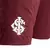 Short masculino de treino da Adidas na cor vinho com logo branco na lateral.