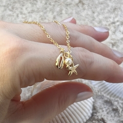 Tornozeleira Búzios E Estrela Dourado na internet
