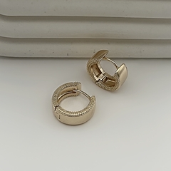 Brinco Argola Textura Lateral Pequena Dourado - comprar online