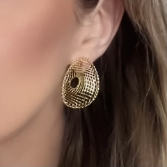 Brinco Orgânico Trama Dourado na internet