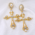 Aretes gran cruz perlas 2S3 - comprar en línea