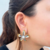 Aretes flor oro-plata perla acero inox C653