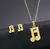 Aretes y collar dorado musical acero inox 1M4