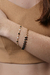 Pulseira bolinhas pretas e gotas vazadas - comprar online