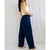 Calça azul de malha feminina TAM G na internet