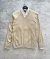 Sweater cuello V beige