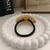 Puny Cuff / Elástico para Cabelo Pélolas em Banho Ouro na internet