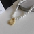 Colar Pérolas Pingente Cravejado - Ouro - comprar online
