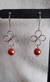 Aros colgantes en material Soft Gol y Perla color cobre. 