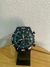 Reloj Grand Touring con numeros en verde
