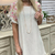 Vestido de manga curta com costura floral de algodão e linho com decote redondo soltinho - comprar online