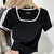 Camisa feminina curta com ombro e fundo - loja online