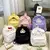 mochila abraço cinnamoroll e amigos