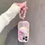 Imagem do Kuromi hello kitty suporte pulseira caso de telefone para iphone 16 15 pro max 1