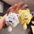 Chaveiro de pelúcia de peixe dos desenhos animados Sanrio Plush Cinnamoroll Pom na internet