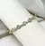 Bracelete Trevo Cravejado Dourado - comprar online