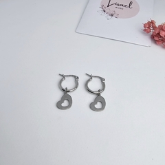 Argollas de acero dije corazón hueco