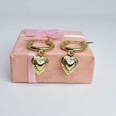 Argollas de acero dorado corazón calado - comprar online