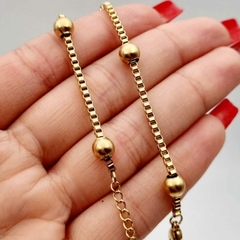 Pulsera de acero dorado box bolitas