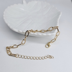 Pulsera de acero dorado figaro