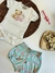 CONJUNTO BEBÊ FEMININO MILON na internet