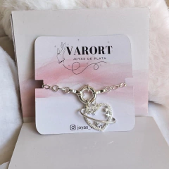 Collar Cierre Timón Corazón Planeta y Circones en internet